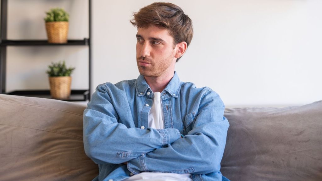 upset young man looking to the side