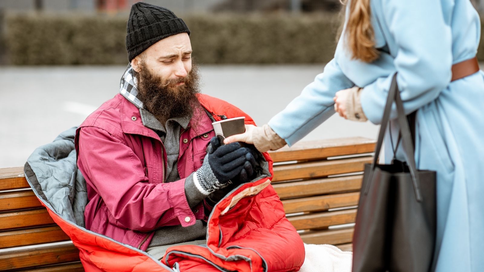 She Wanted To Buy Coffee And A Sandwich For A Homeless Man — But Only Had Enough For The Coffee woman giving homeless man a cup of coffee