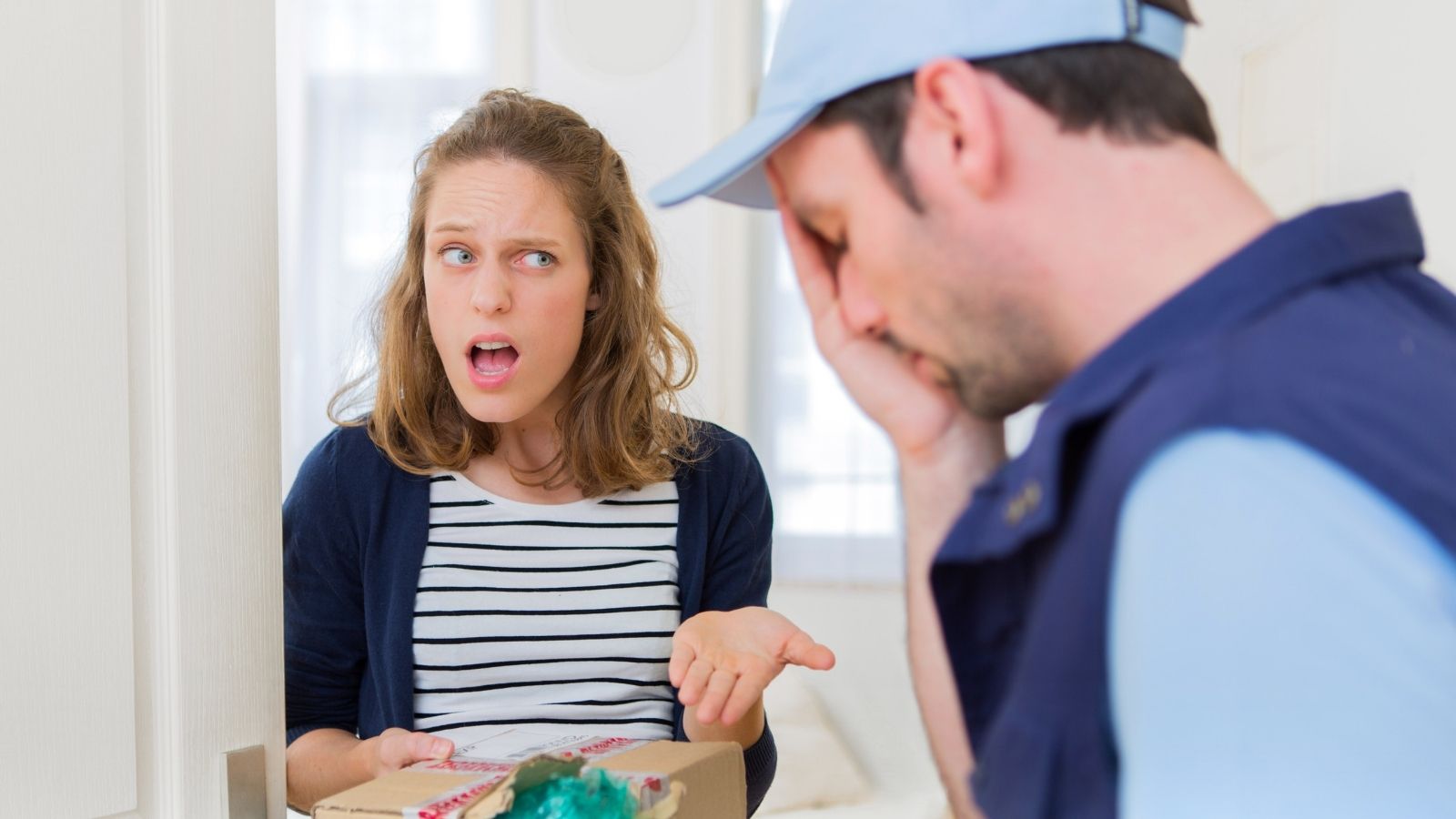 woman upset at delivery driver