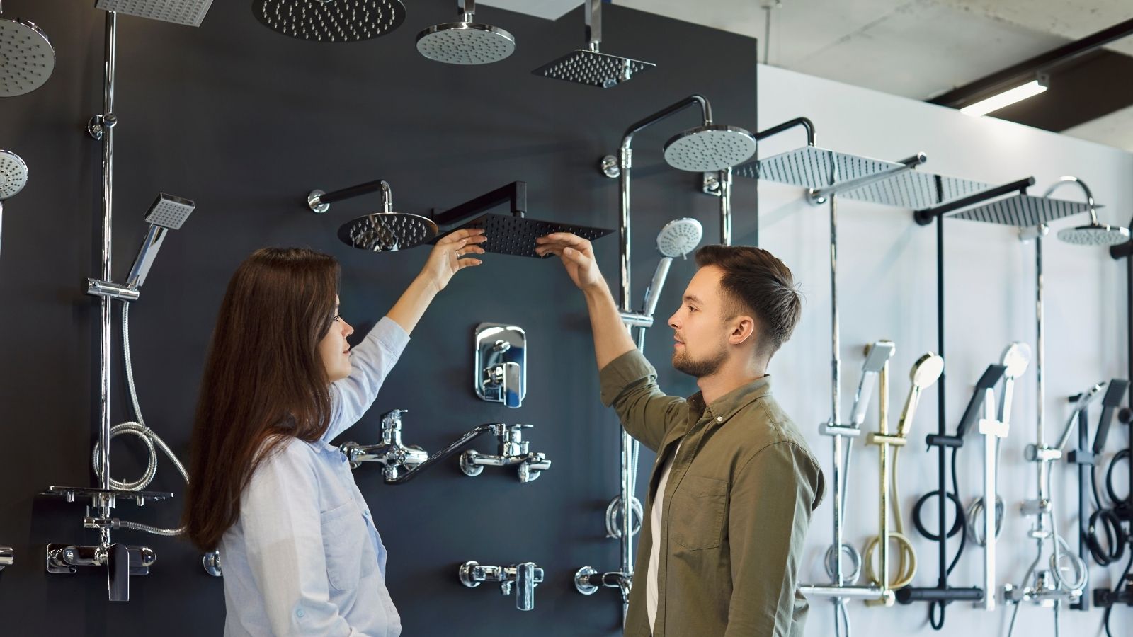 Boyfriend Agrees To Help His Girlfriend Renovate Her Bathroom, But Then She Decides To Hire Another Contractor couple looking at showerheads in a store