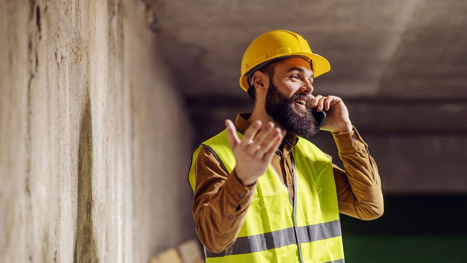 construction worker talking on the phone