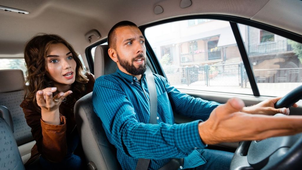 angry woman arguing with Uber driver