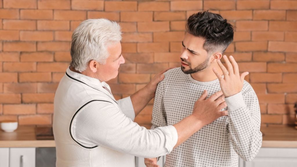 young man arguing with his dad