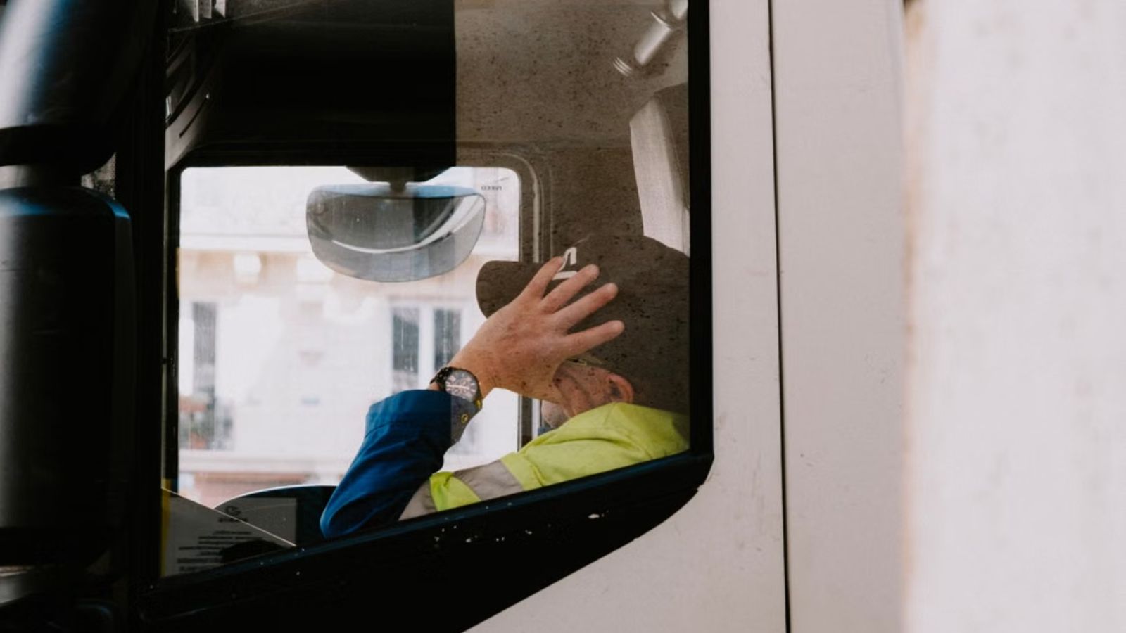 Man Went to a Customer’s House With His Coworker, Who Slept in the Truck, So He Left Him Behind Man sleeping in the truck