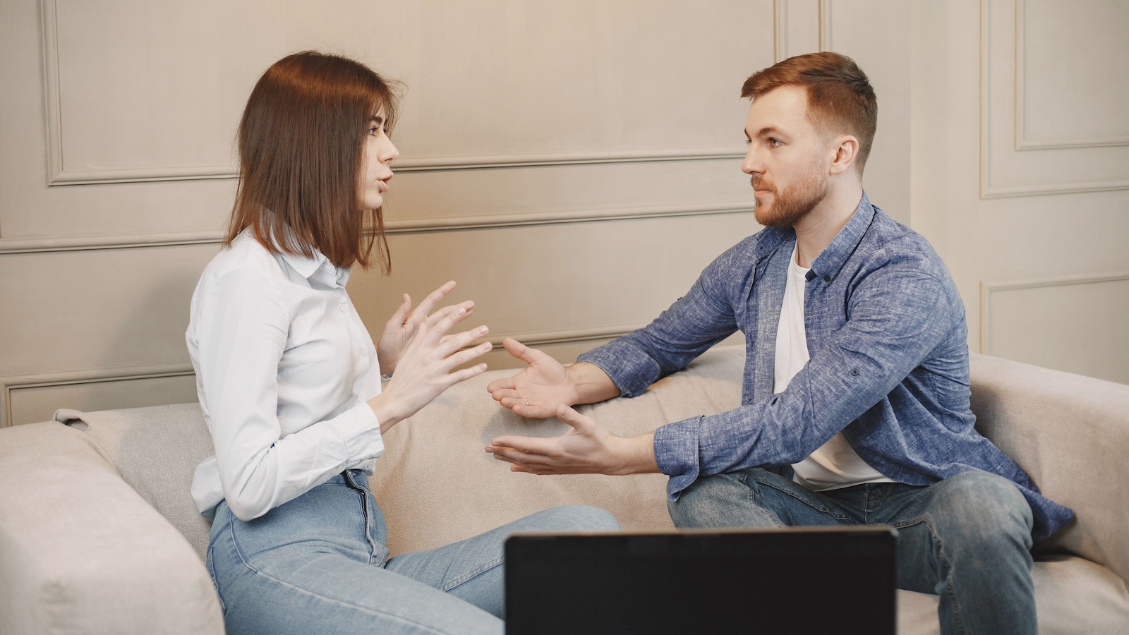 He Didnt Want To Go To A Concert With His Girlfriend Since He Wasnt A Big Fan Of The Artist, But She Insisted They Go Together Man and woman having an intense conversation at home