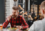 Man Is Frustrated By Friend Who Takes Forever To Eat, Even After The Server Has Cleared The Table