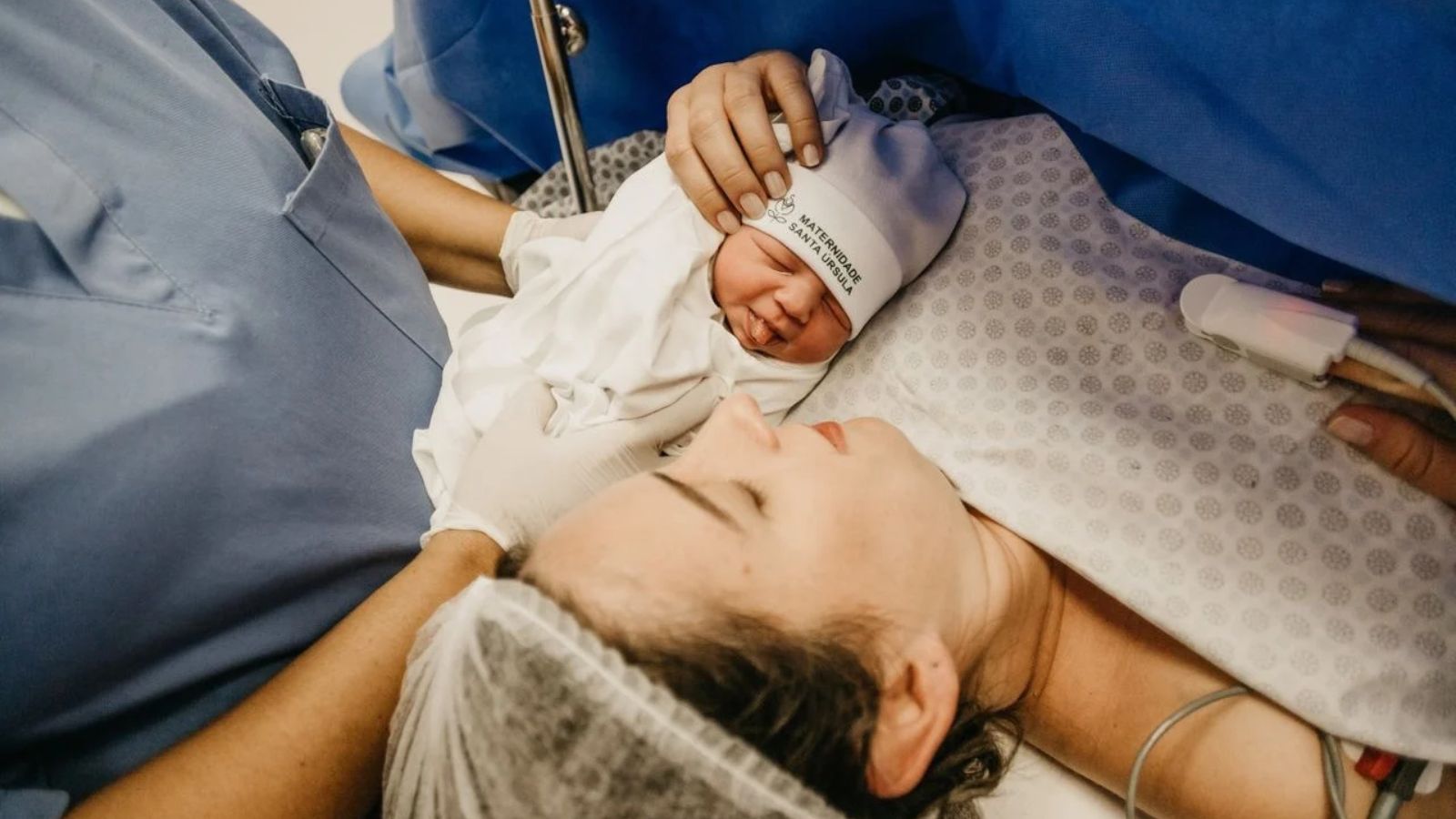 Mom holding newborn