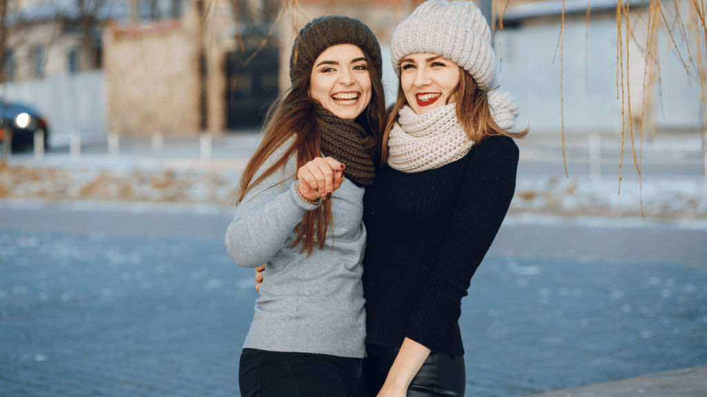 She Was Fed Up With Unexpected Visits From People Who Never Asked First, And Made It Clear Her Home Was No Longer Open For Drop Ins Two girls posing and smiling outside an apartment building