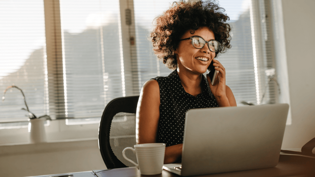 Employee Was Told To Put More Effort Into Her Appearance For A Promotion, So She Took The Advice Literally And Completely Changed Her Look black business woman on the phone