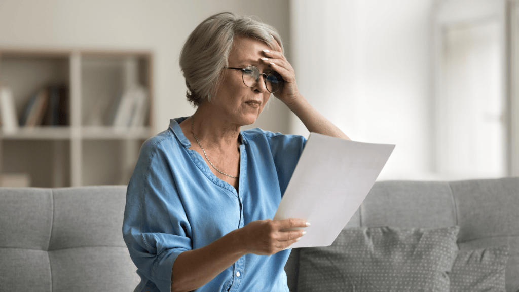confused woman reading letter