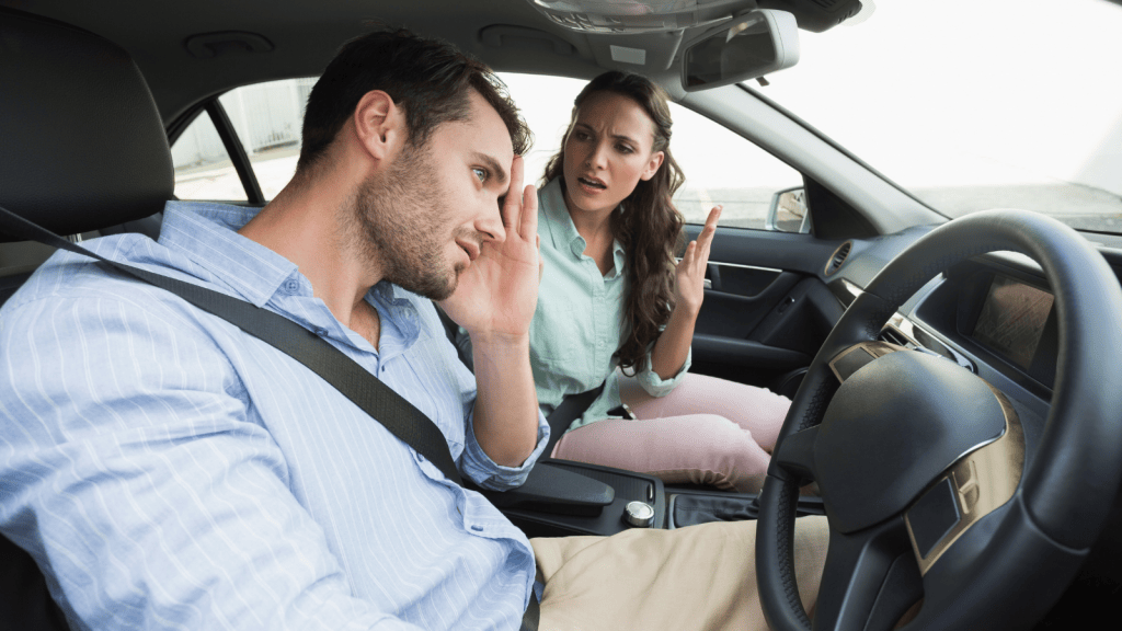 couple arguing in a car