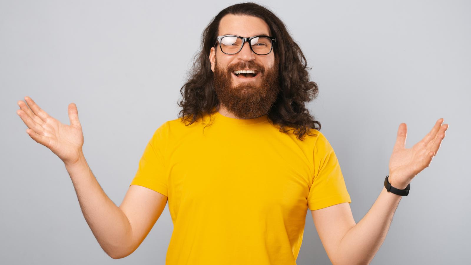 A Mans Family Wants Him To Cut His Long Hair Before His Sisters Wedding But He Refuses To Do It man with long hair and a beard