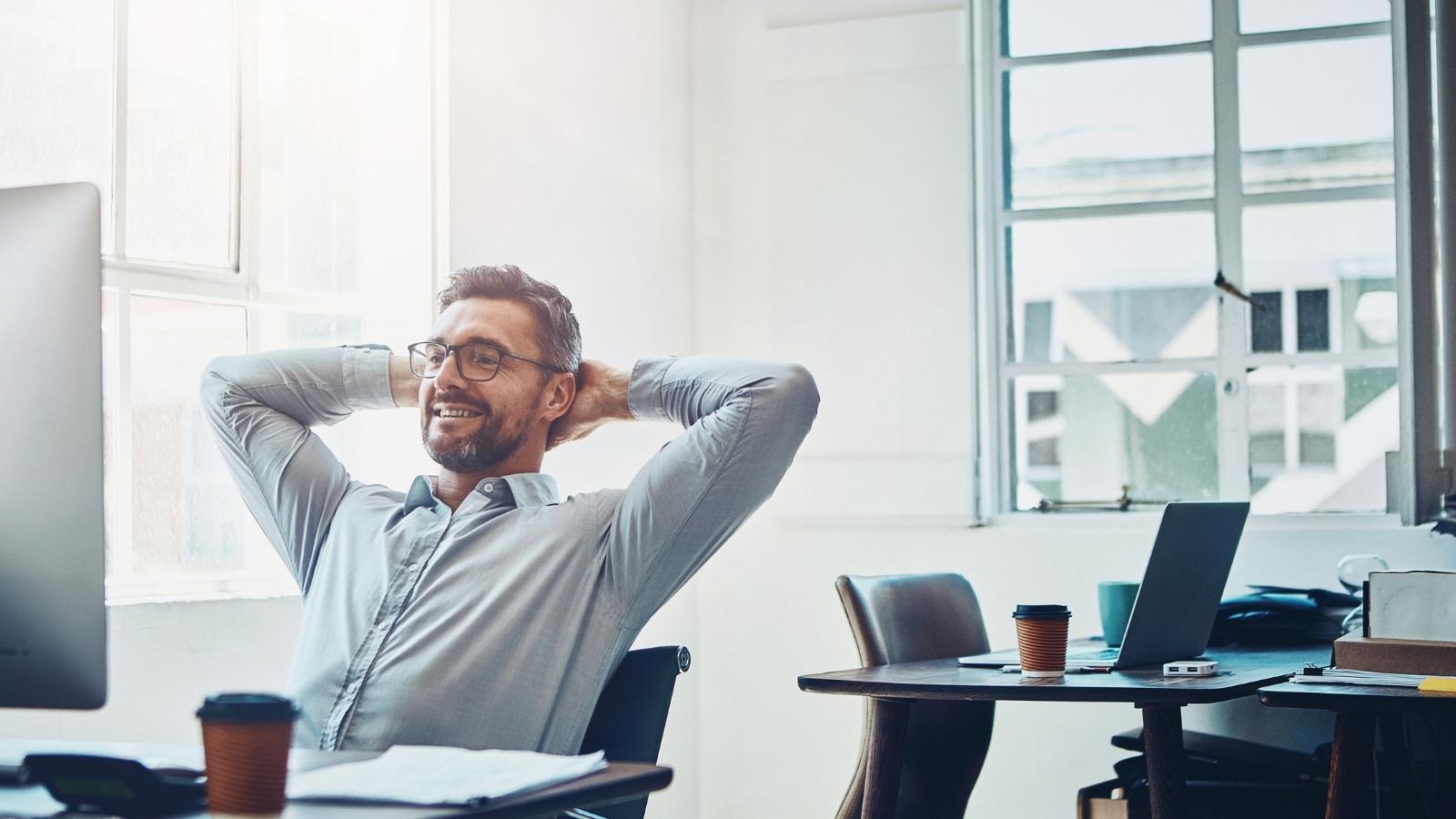 He Had Helped To Streamline His Department So That It Ran Well, But Then A New Manager Came In And Ruined Everything, Even Demoting Him, Which Led To The Company Losing Huge Clients And The Manager Getting Fired Guy happy at work