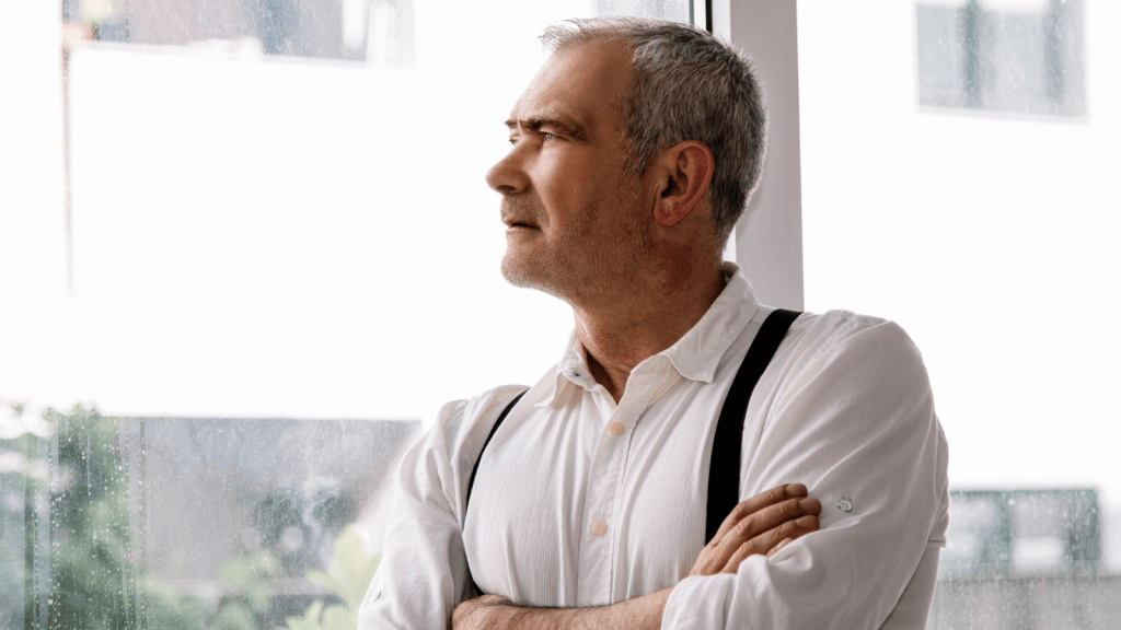 A Husband Watched a Struggling Neighbor Constantly Exploit His Wife’s Good Will—Until He Drew a Firm Line and Stopped the Favor Train middle aged man angrily looking out window