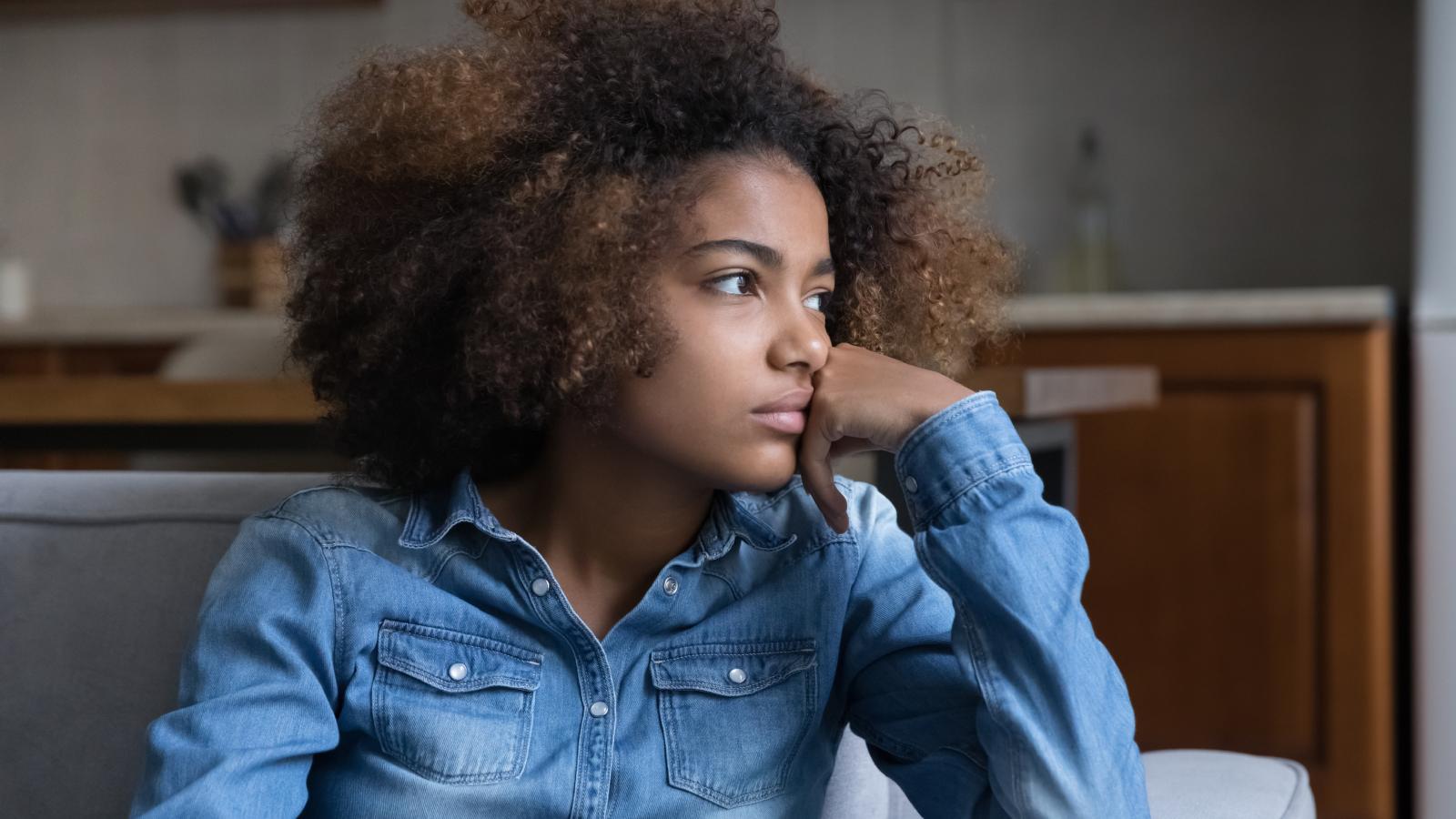 Woman Is Considering Skipping Her Fathers Wedding Because Her Aunt Might Be There woman in deep thought