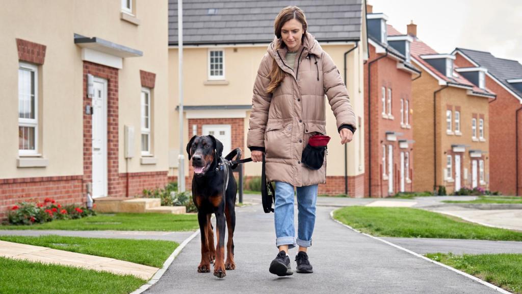 woman walking her dog