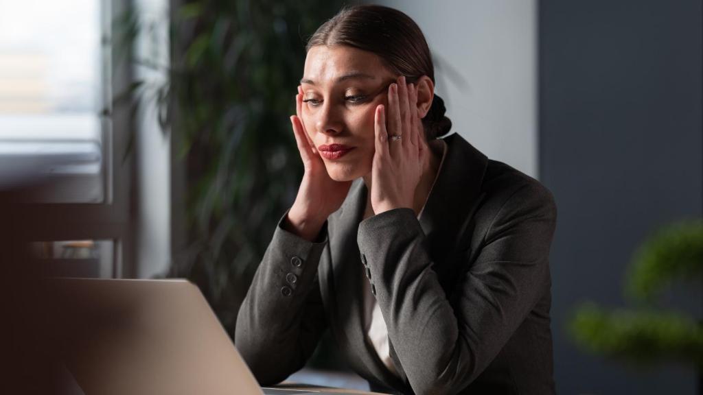 woman stressed out at her desk
