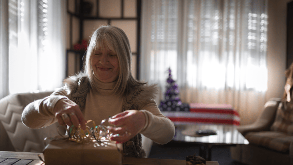 One Mom To Be Was Underwhelmed By Her Birthday Presents, But She’s Torn Between Feeling Overlooked And Worrying That She Should Simply Be Grateful old woman wrapping present