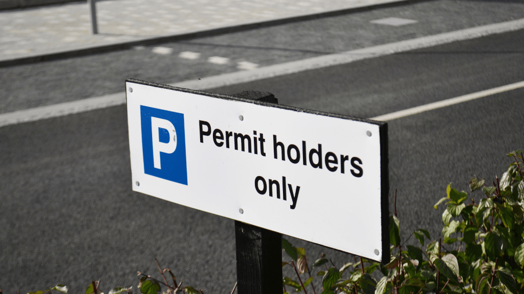 They Banned Non Residents to Save Their Curb Space—Until Guests, Delivery Drivers, and Trade Vehicles Got Towed permit holders only sign