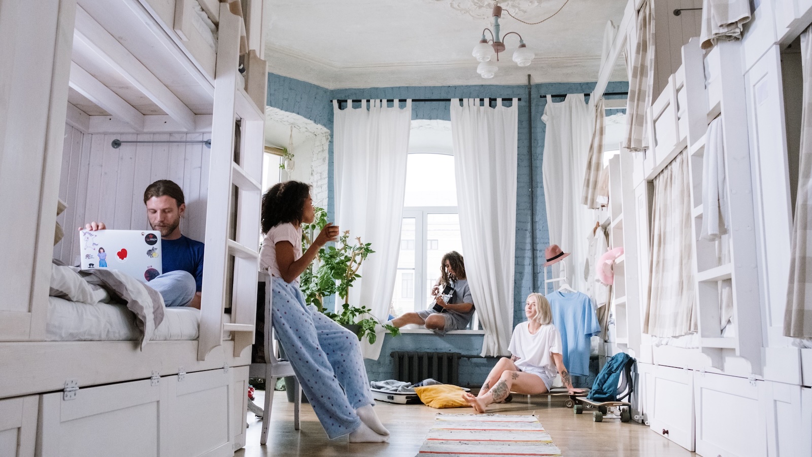 He Tolerated a Rotating Door of Post Breakup Guests—Until the New Girlfriend Officially Moved In for 20 Days Straight roommates all hanging out together in one space