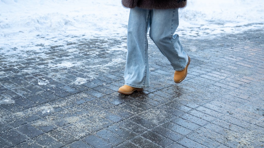 salting a sidewalk