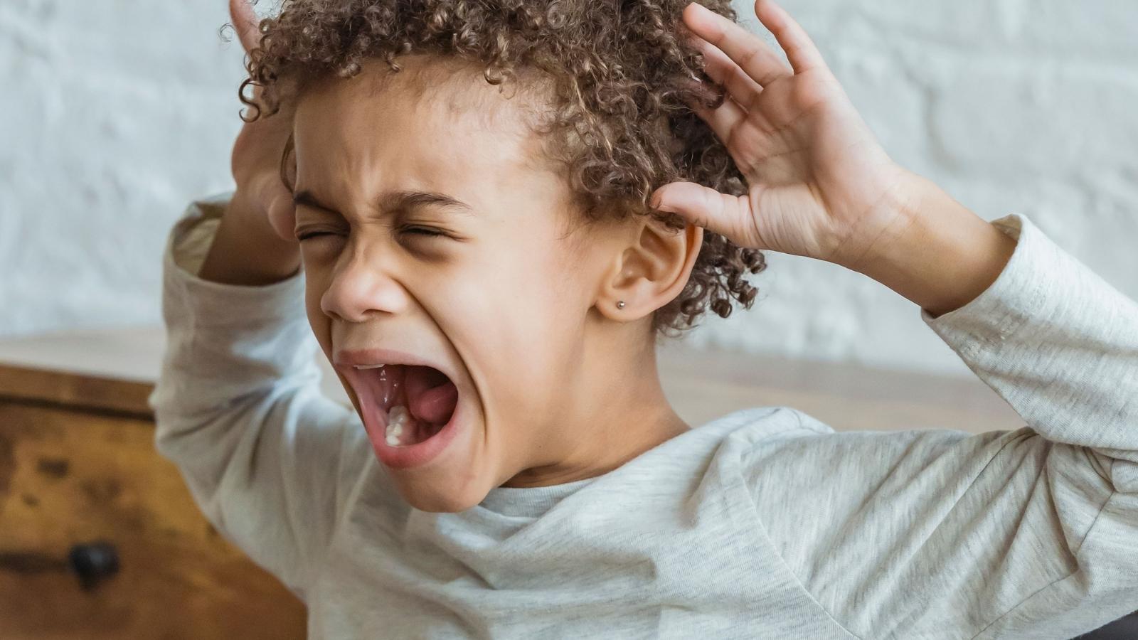 screaming kid misbehaving