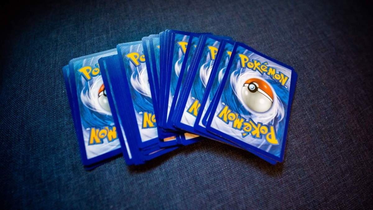 Father Got Tired Of Paying $15 A Pack For His Sons Pokémon Cards, So He Rigged Them With His Dream Cards stack of pokemon cards