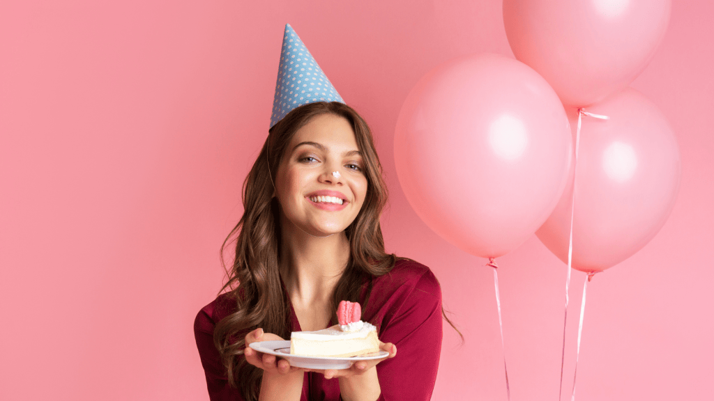 young woman birthday surrounded by party decorations